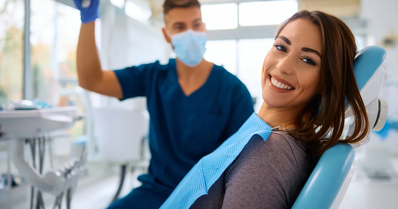 Patient Smiling & Feeling Good at the Dentist